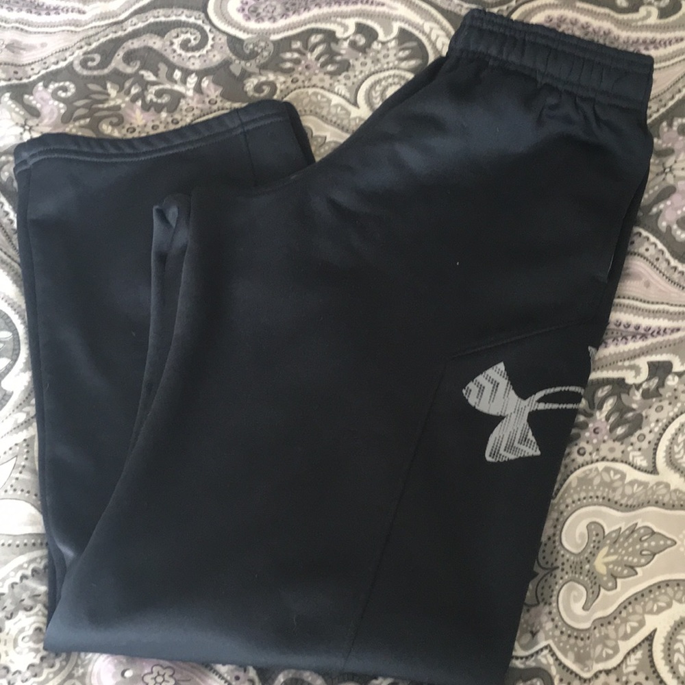 Boys Black Under Armour jogging pants.